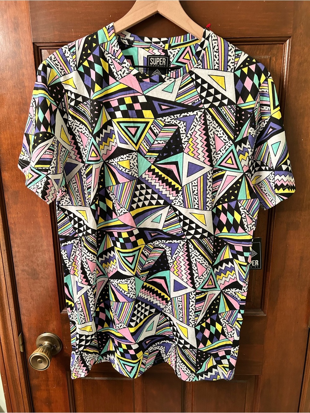SUPER MASSIVE NWT Pastel geometric print top. Size L